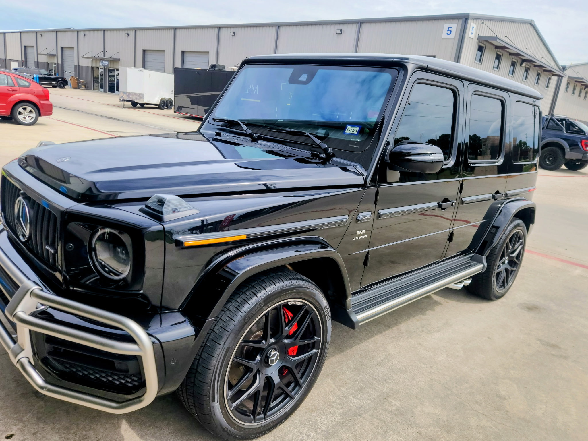 Professional auto detailing with paint protection and ceramic coating